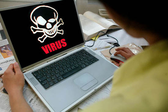 07 May 2004, Paris, France --- An internaut is infected by one of many internet viruses of recent years proliferating on the net such as My Doom, Sasser and I Love You. --- Image by © Lucas Schifres/Corbis